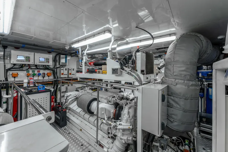 Noroader Yacht Photos Pics Engine room of 2020 Sunseeker 116 yacht, featuring advanced machinery and control panels.