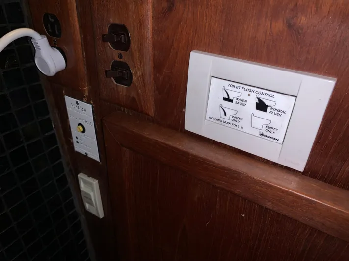 Paradise Falls Yacht Photos Pics Toilet flush control on a 1988 Harbor Master 520 Coastal boat.