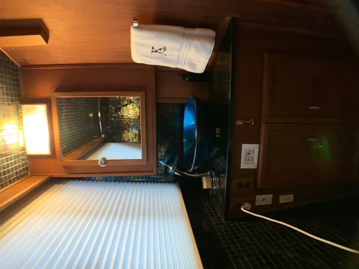 Paradise Falls Yacht Photos Pics Bathroom in 1988 Harbor Master 520 Coastal with blue sink.