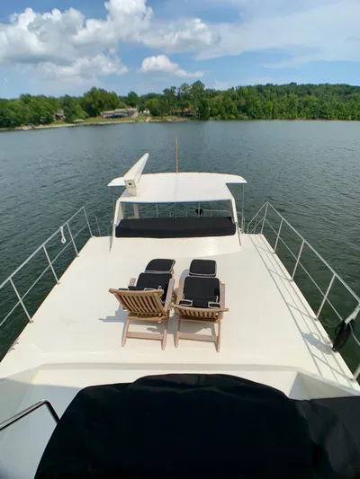 Paradise Falls Yacht Photos Pics Deck of 1988 Harbor Master 520 Coastal with lounge chairs.