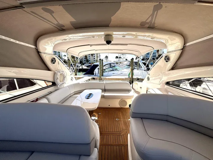 Blind Date Yacht Photos Pics Luxurious 2005 Viking Princess V50 yacht interior with elegant seating and wood flooring.