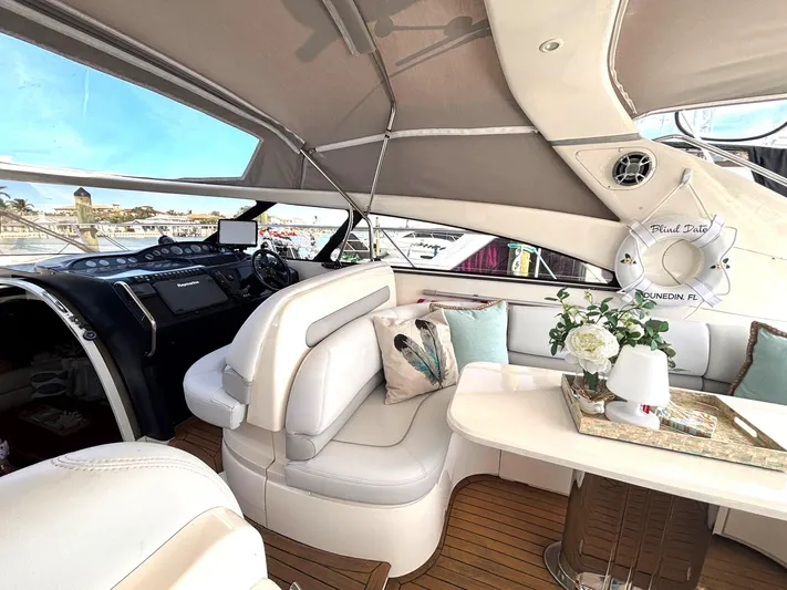 Blind Date Yacht Photos Pics Luxurious 2005 Viking Princess V50 yacht interior with elegant seating and decor.