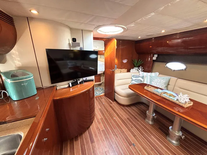 Blind Date Yacht Photos Pics Luxurious 2005 Viking Princess V50 yacht interior with wood flooring and modern amenities.