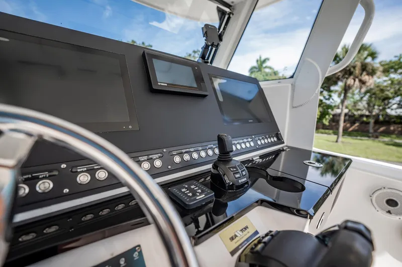 Yacht Photos Pics Control panel of 2021 Everglades 335 Center Console boat with modern navigation equipment.