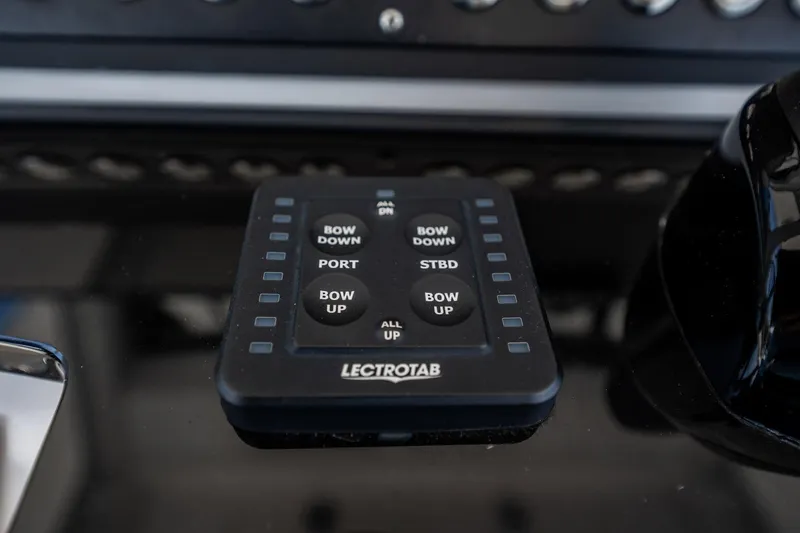  Yacht Photos Pics Control panel of a 2021 Everglades 335 Center Console boat with Lectrotab buttons.