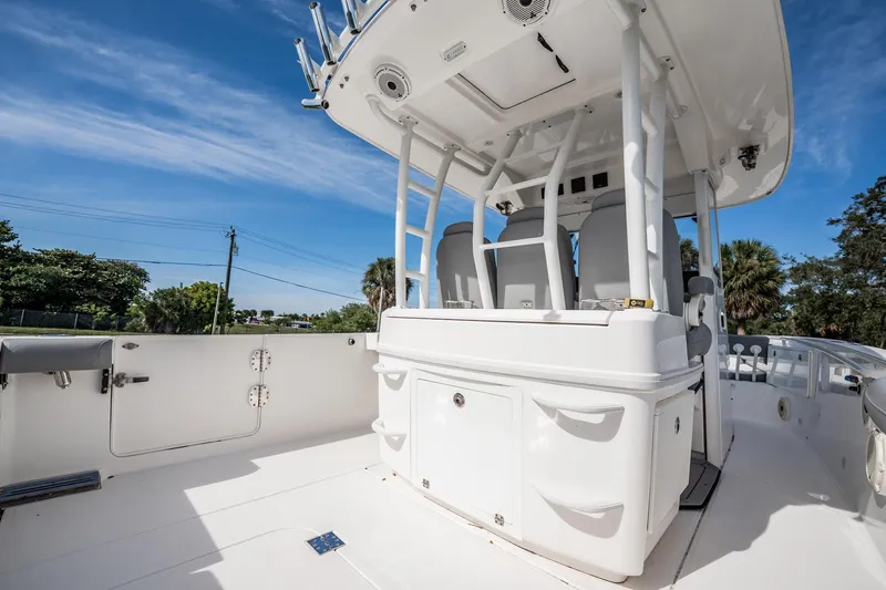 Yacht Photos Pics 2021 Everglades 335 Center Console boat with spacious deck and modern helm station.