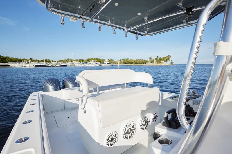  Yacht Photos Pics 2022 Contender 35 ST boat on water, featuring sleek design and powerful engines.