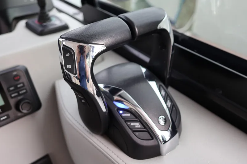  Yacht Photos Pics Throttle control of 2022 Regal 36 XO boat, featuring sleek design and modern controls.