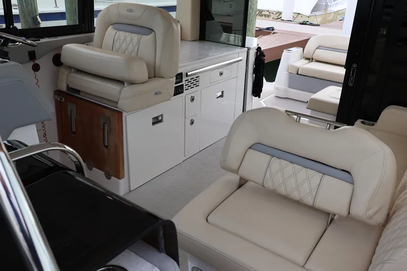  Yacht Photos Pics Luxurious interior of 2022 Regal 36 XO boat with plush seating and modern design.