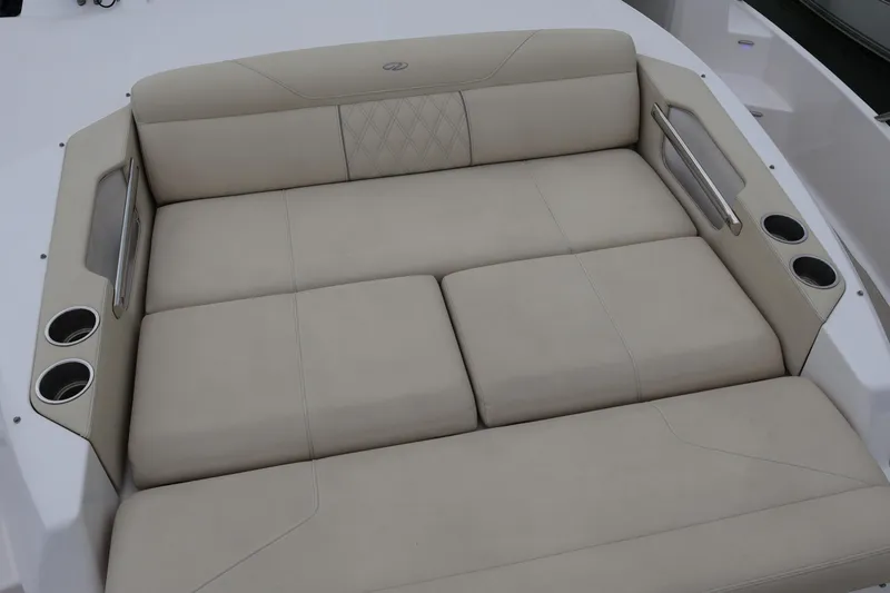  Yacht Photos Pics Luxurious seating on 2022 Regal 36 XO boat with cup holders and armrests.
