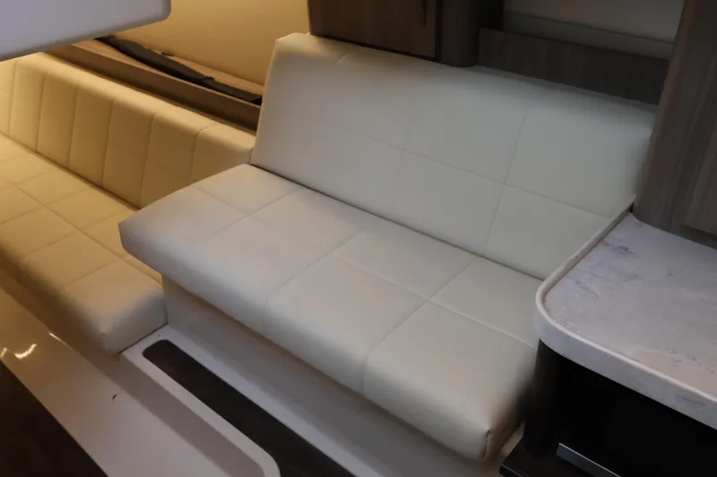  Yacht Photos Pics 2022 Regal 36 XO interior with cream leather seating and modern design.