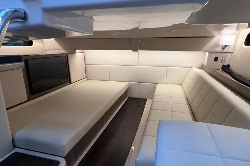  Yacht Photos Pics Luxurious interior of 2022 Regal 36 XO yacht with plush seating and modern design.