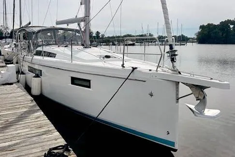 Dream Weaver Yacht Photos Pics 2022 Jeanneau Sun Odyssey 410 sailboat docked at a marina.