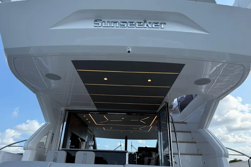  Yacht Photos Pics 2024 Sunseeker Manhattan 55 yacht, rear view with modern interior and sleek design.