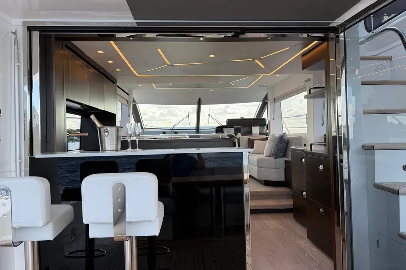  Yacht Photos Pics Luxurious interior of 2024 Sunseeker Manhattan 55 yacht with modern design and elegant furnishings.