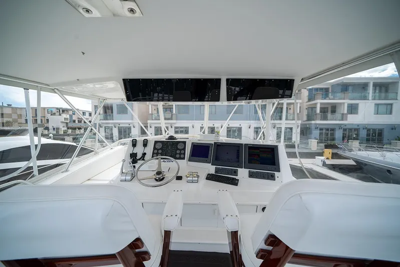 My Way Yacht Photos Pics Helm of 1999 Viking SF 50 HT yacht with modern navigation equipment.