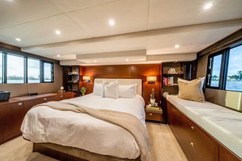 Aquavita Yacht Photos Pics Luxurious bedroom interior of 2012 Princess 64 Flybridge Motor Yacht with elegant decor.