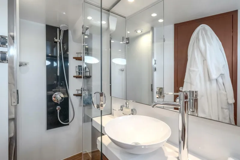 Aquavita Yacht Photos Pics Luxurious bathroom on 2012 Princess 64 Flybridge Motor Yacht with modern fixtures and elegant design.
