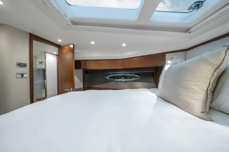 Aquavita Yacht Photos Pics Luxurious bedroom interior of 2012 Princess 64 Flybridge Motor Yacht with skylight.