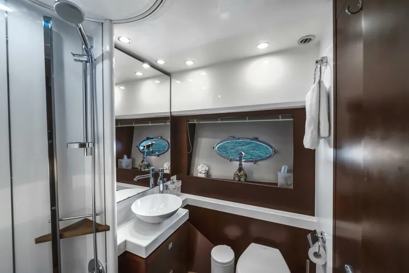 Aquavita Yacht Photos Pics Luxurious bathroom on 2012 Princess 64 Flybridge Motor Yacht with modern fixtures.