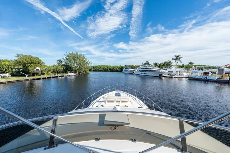 Aquavita Yacht Photos Pics Bow view from 2012 Princess 64 Flybridge Motor Yacht on a sunny day.