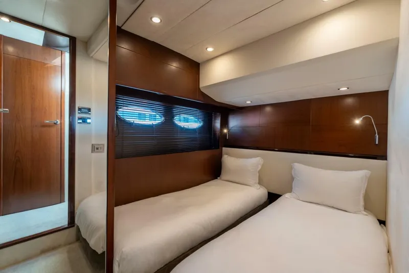 Aquavita Yacht Photos Pics Luxurious twin cabin interior of 2012 Princess 64 Flybridge Motor Yacht.