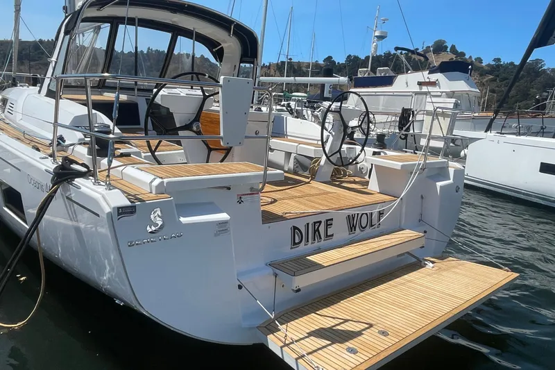 Dire Wolf Yacht Photos Pics 2020 Beneteau Oceanis 46.1 yacht "Dire Wolf" docked at marina, rear view.