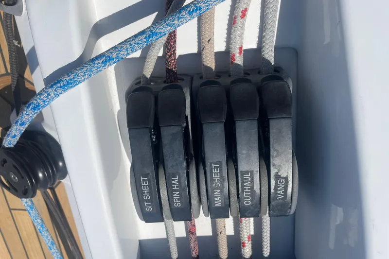 Dire Wolf Yacht Photos Pics Close-up of sailboat rope clutches on a 2020 Beneteau Oceanis 46.1.