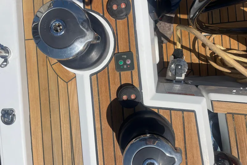 Dire Wolf Yacht Photos Pics Deck of 2020 Beneteau Oceanis 46.1 yacht with winches and teak flooring.