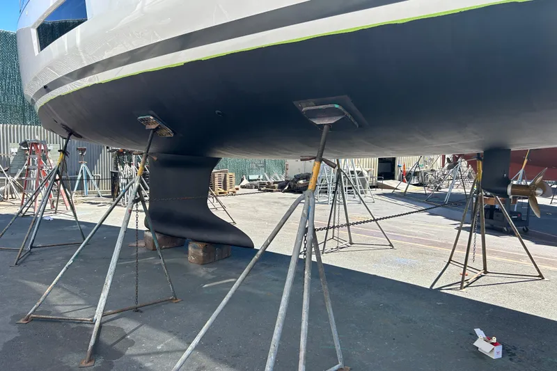 Dire Wolf Yacht Photos Pics 2020 Beneteau Oceanis 46.1 yacht on stands, showcasing hull and keel.