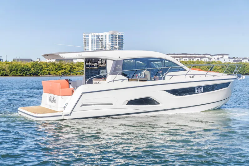  Yacht Photos Pics 2020 Sealine C390 yacht cruising on a sunny day, featuring sleek design and modern amenities.