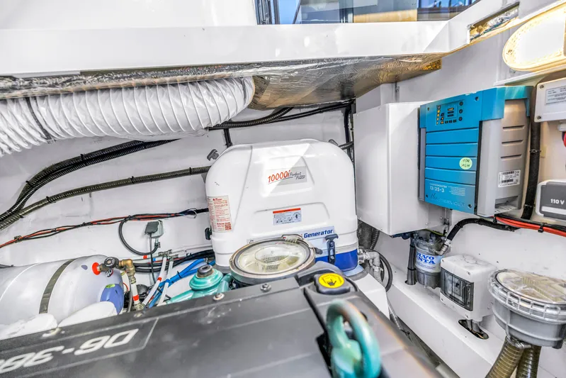  Yacht Photos Pics Engine room of 2020 Sealine C390 yacht with generator and electrical components.