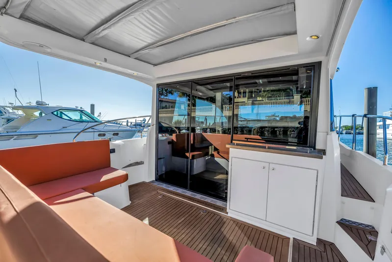  Yacht Photos Pics 2020 Sealine C390 yacht interior with sleek design and comfortable seating.