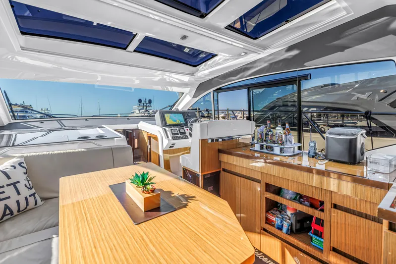  Yacht Photos Pics Luxurious interior of 2020 Sealine C390 yacht with modern amenities and panoramic windows.