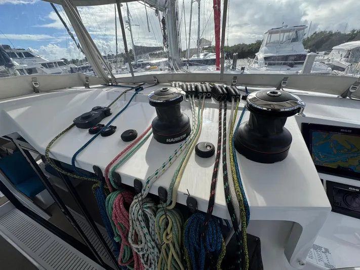 Encantado Yacht Photos Pics Sailing yacht NEEL 47 cockpit with winches and colorful ropes, 2023 model.