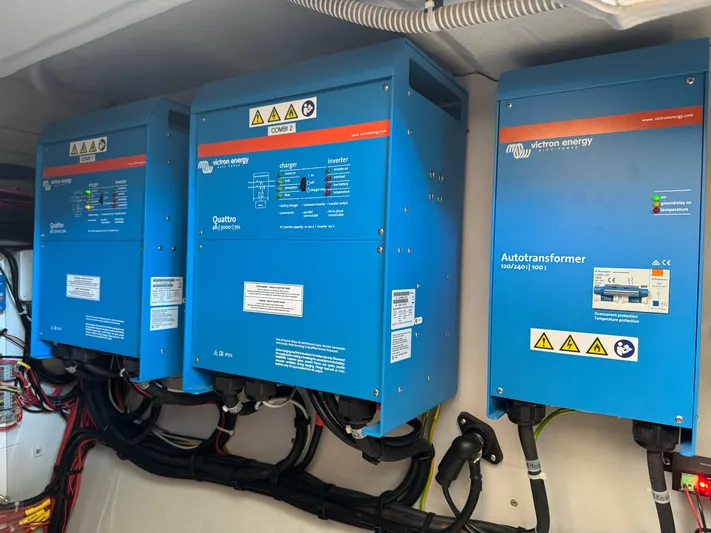 Encantado Yacht Photos Pics Blue Victron Energy equipment in NEEL 47, 2023 model, featuring Quattro and Autotransformer units.