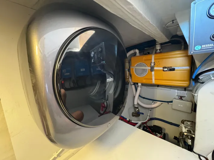 Encantado Yacht Photos Pics Engine room of 2023 NEEL 47 with modern equipment and piping.