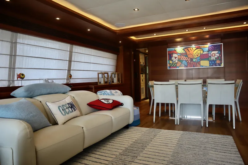  Yacht Photos Pics Luxurious interior of 2016 Custom Line 97 yacht with modern decor and comfortable seating.
