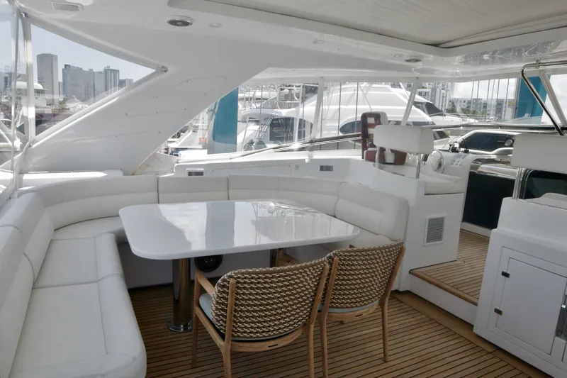  Yacht Photos Pics Luxurious 2016 Custom Line 97 yacht interior with elegant seating and dining area.