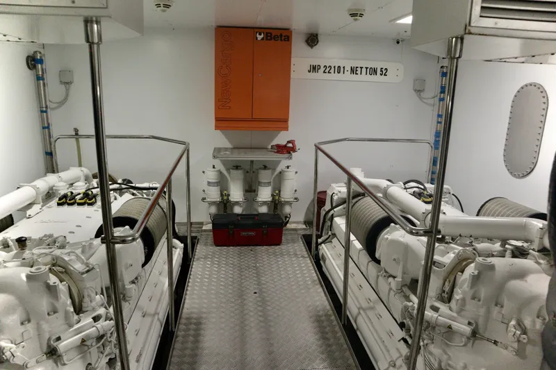  Yacht Photos Pics Engine room of 2016 Custom Line 97 yacht, featuring dual engines and control systems.