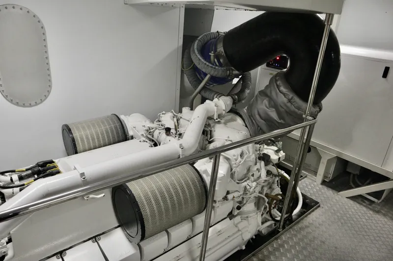  Yacht Photos Pics Engine room of 2016 Custom Line 97 yacht, featuring advanced machinery and components.