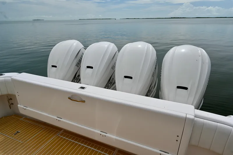  Yacht Photos Pics 2019 Intrepid 475 Sport Yacht with four powerful outboard engines on calm water.