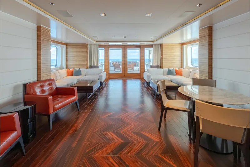 Superyacht W Yacht Photos Pics Luxurious interior of 2013 Feadship motor yacht with elegant seating and wooden flooring.