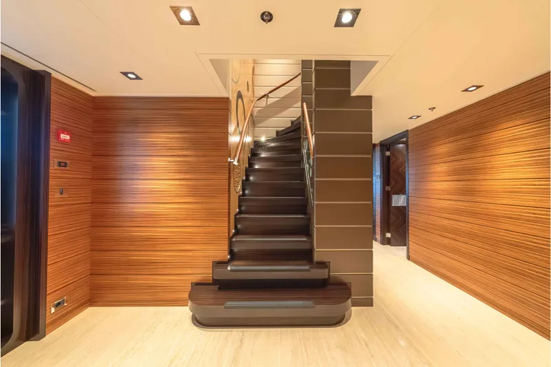 Superyacht W Yacht Photos Pics Luxurious interior of 2013 Feadship motor yacht with elegant wooden staircase.