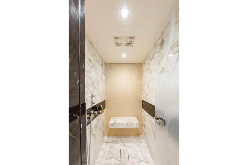 Superyacht W Yacht Photos Pics Luxurious marble bathroom in 2013 Feadship motor yacht, featuring elegant design and modern fixtures.