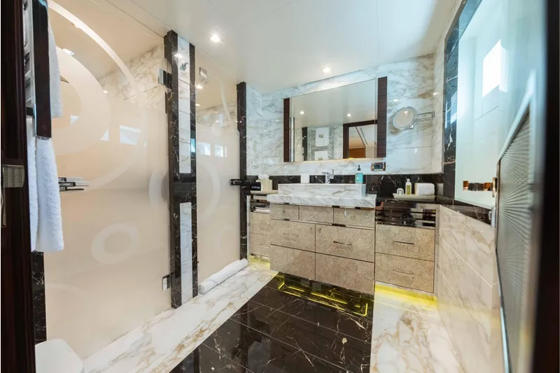 Superyacht W Yacht Photos Pics Luxurious bathroom interior on 2013 Feadship motor yacht, featuring elegant marble and modern fixtures.