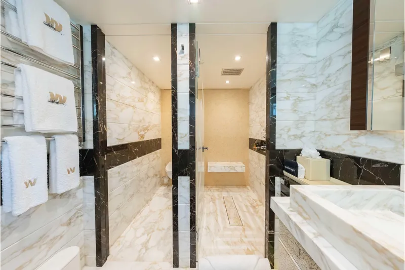 Superyacht W Yacht Photos Pics Luxurious marble bathroom on 2013 Feadship motor yacht, featuring elegant design and plush amenities.
