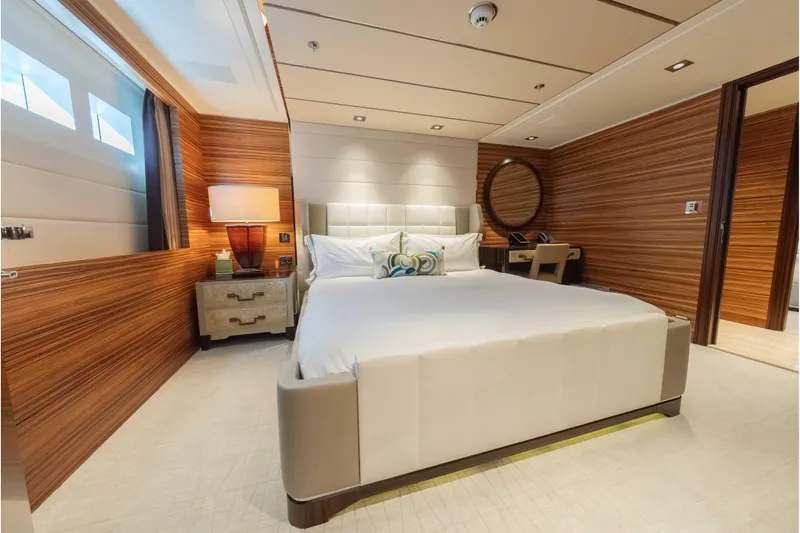 Superyacht W Yacht Photos Pics Luxurious bedroom interior on 2013 Feadship Motor Yacht with modern wood paneling and elegant decor.