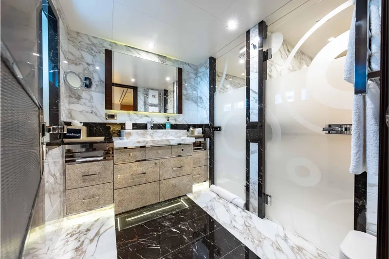 Superyacht W Yacht Photos Pics Luxurious marble bathroom on 2013 Feadship motor yacht, featuring elegant fixtures and modern design.
