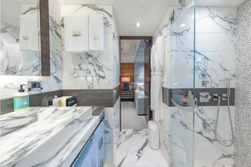 Superyacht W Yacht Photos Pics Luxurious marble bathroom on 2013 Feadship motor yacht, featuring modern fixtures and elegant design.